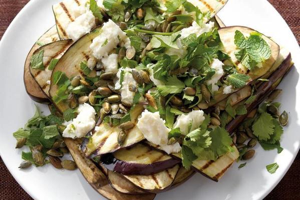 eggplant with cheese and pumpkin seeds