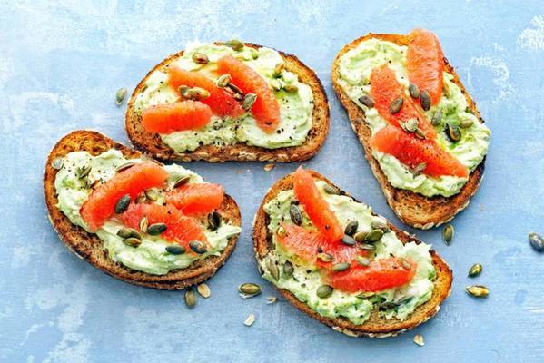 toast with goat's cheese-avocado spread and grapefruit