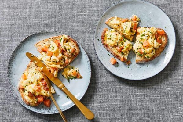 scrambled eggs with smoked salmon on sourdough bread