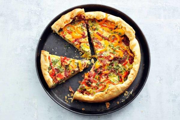 spring quiche with salami, pointed pepper and herbs