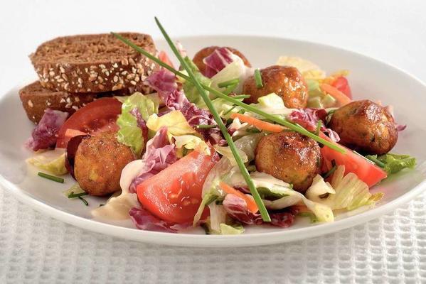 salad with vegetable balls and caesar dressing