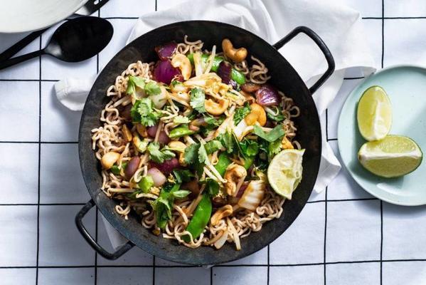 single wok dish with noodles and cashew nuts