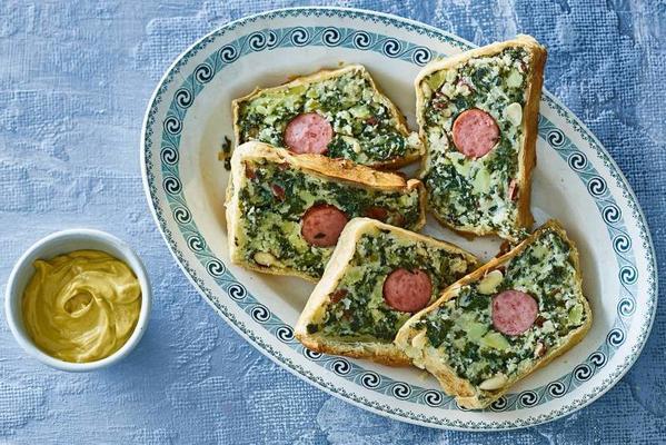 kale cake with sausage and almonds