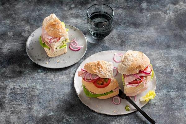 mortadella sandwich with dairy spread, cabbage lettuce and tomato