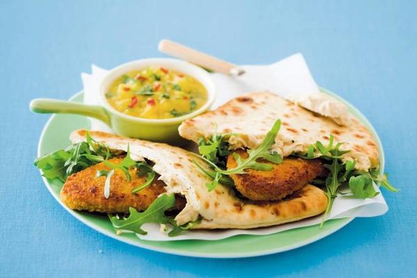 chicken with hummus, naan bread and mango salsa