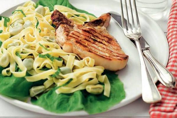 grilled rib chop with tagliatelle and broad beans