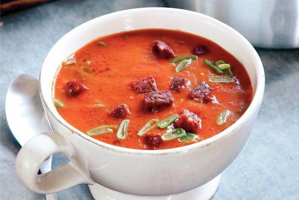 orange soup with roasted peppers and chorizo