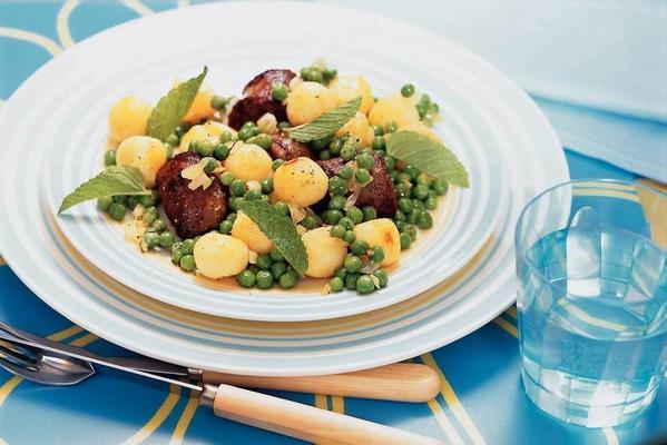bratwurst dish with peas and mint