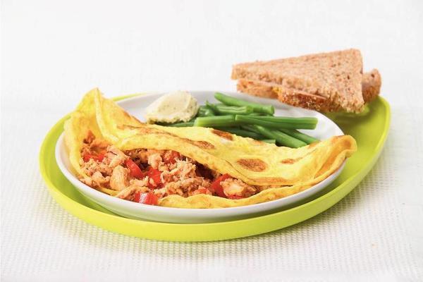 omelet filled with salmon and paprika