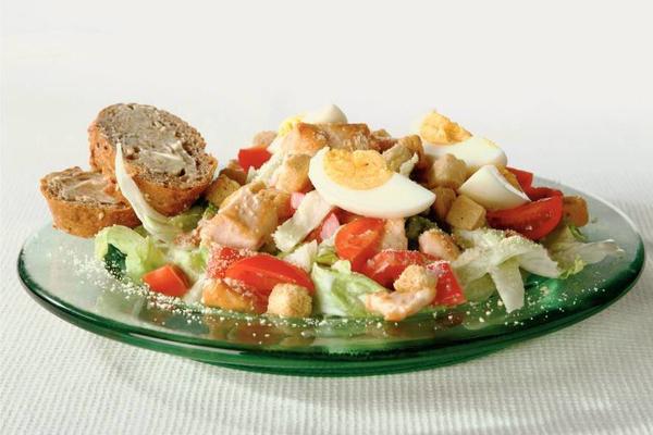 delicious caesar salad with baguette