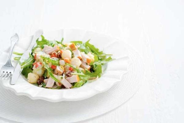 meal salad with baby potatoes and raw vegetables