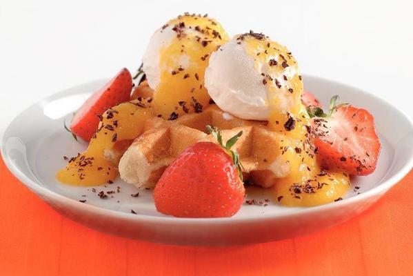 orange-top waffle with ice cream and strawberries