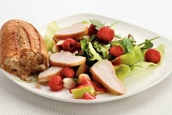 salad with fried chicken and raspberries