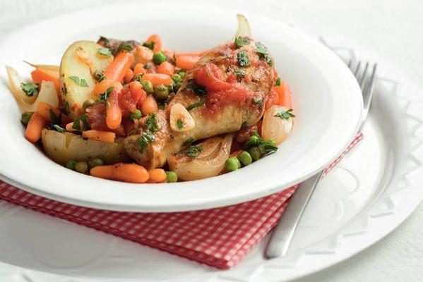 stewed chicken with garden peas and carrots