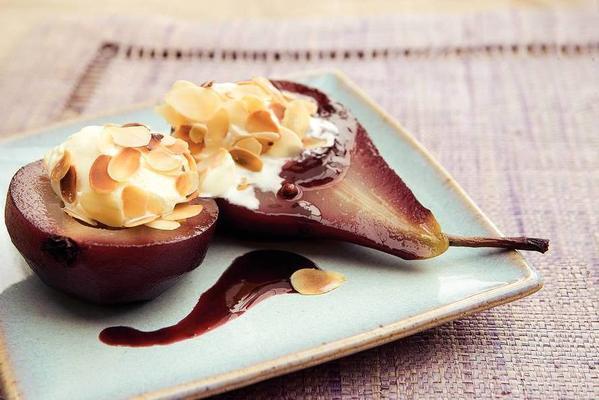 stew pears in red wine syrup with almond ice cream