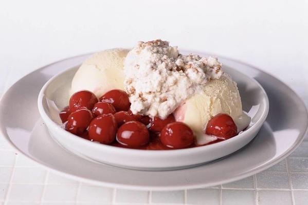 ice cream with gingerbread cream and hot cherries