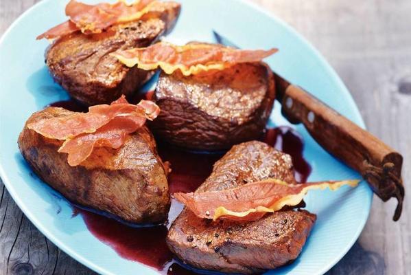steak with red wine sauce and ham