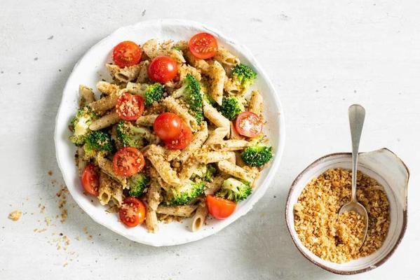 pasta pesto with broccoli, garlic crumbs and cherry tomatoes