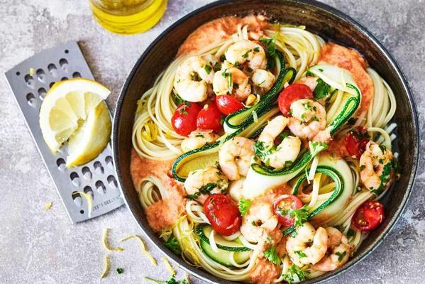 shrimp with zucchini and pasta in creamy tomato sauce