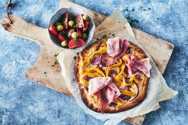 pizza bianca with raw parma ham and roasted yellow pepper