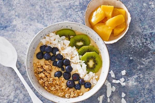 smoothie bowl with coconut water, fruit and granola