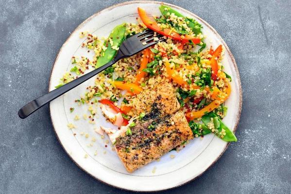 quinoa with salmon, snow peas, peppers and green herbs