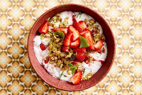 cottage cheese with matcha granola, strawberries and basil