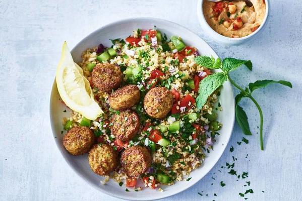 richly filled lebanese salad with hummus and falafel