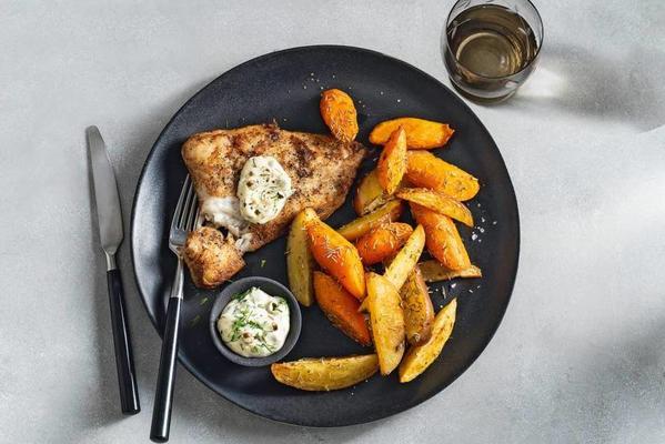 white fish with caper mayonnaise, rosemary potatoes and winter carrot