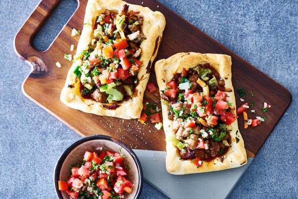 Italian puff pastry cakes with sausage and tomato salsa