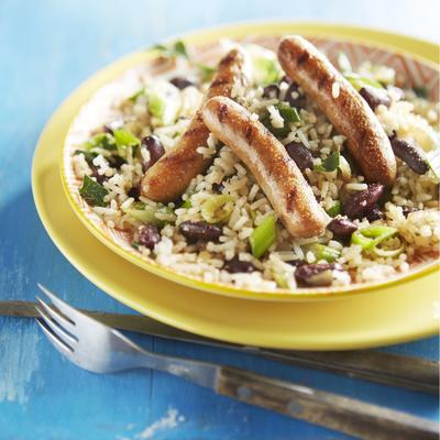 caribbean rice with beans and grilled sausages