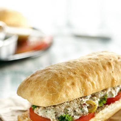sandwich with sardines, olives and parsley