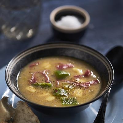 onion soup with salami and old cheese