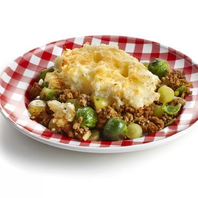 sprouts dish with minced meat and old cheese