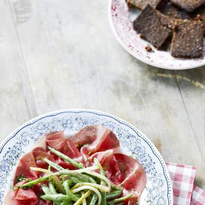 carpaccio of smoked meat with bean salad