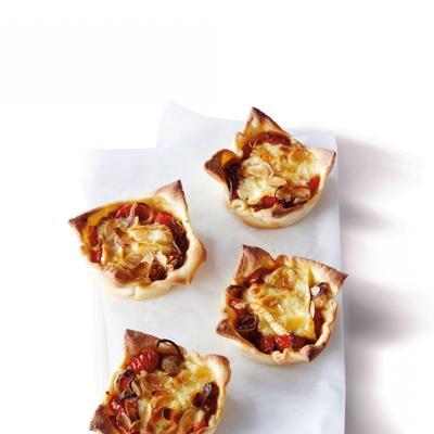mini pie with sweet tomatoes and brie