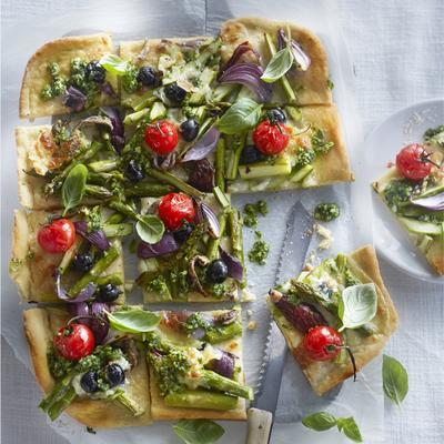 pizza with green asparagus, anchovies and spinach pesto