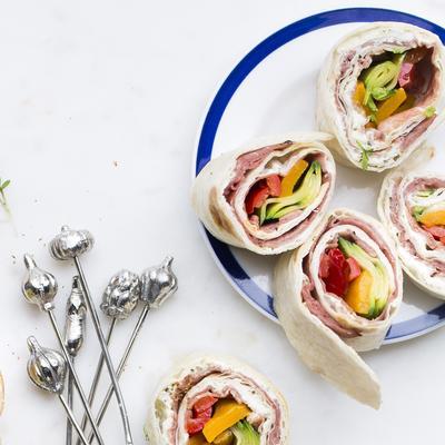 tortilla rolls with roast beef and grilled vegetables