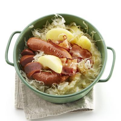 sauerkraut dish with apple, bacon and smoked sausage