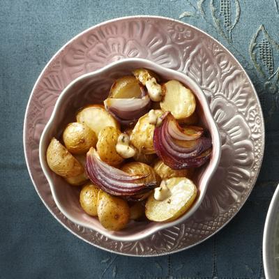 baby potatoes with red onion and herb butter