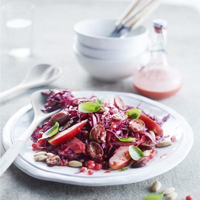 red cabbage salad with raspberry dressing, apple and chorizo