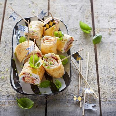 omelet rolls with raw ham and herb ricotta
