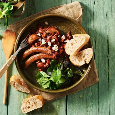 lentil dish with mushrooms and sausages