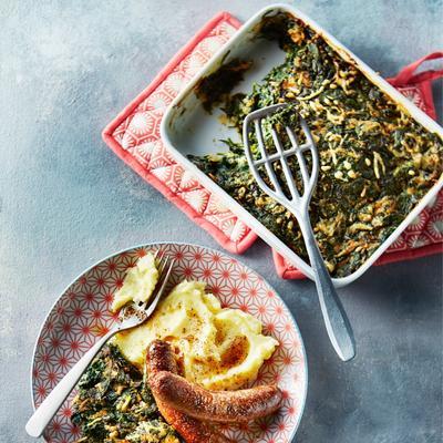 spinach gratin with mashed potatoes and sauces