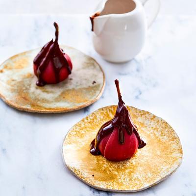 stuffed cooking pears with almond paste and hot chocolate sauce