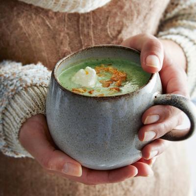 broccoli-almond soup with roquefort and almond crunch