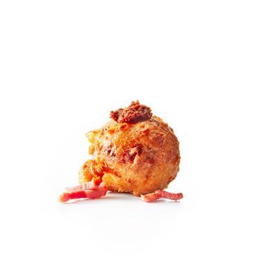oliebollen with bacon and red pesto