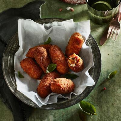 croquettes of tomato stew with feta and pine nuts