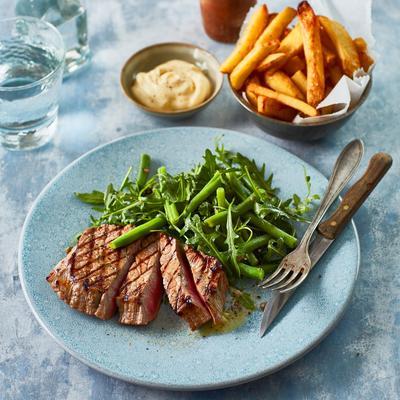 grilled steak with lukewarm green beans salad and oven fries