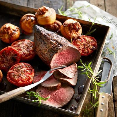 roast beef with yorkshire pudding and puffed tomatoes